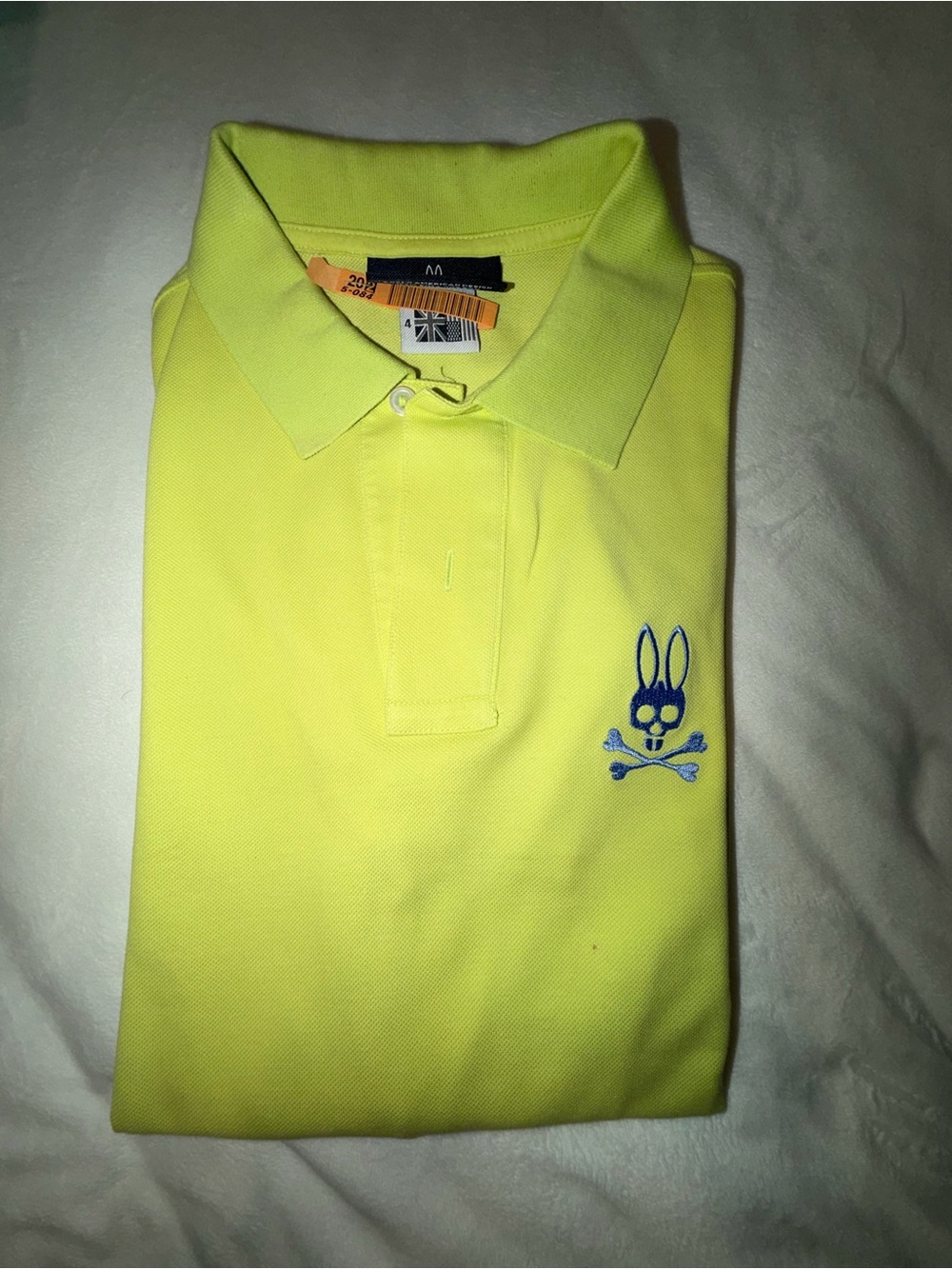 Psycho Bunny Men’s Neon Yellow Polo with Blue Skull & Crossbones Logo